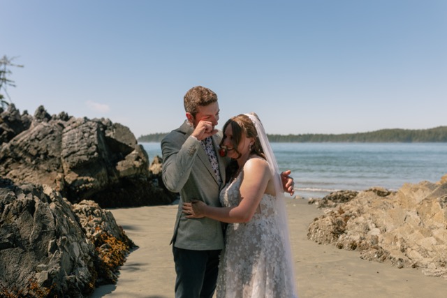 Couple embracing after their wedding ceremony